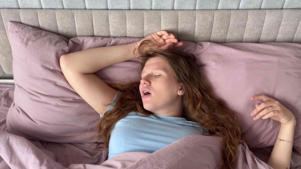 Woman sleeping with her mouth open